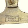 Merkteken WILINSON SWORD Steltschaats Pathfinder schaatsenverkoper W.H. Fagan, London (Engeland)
