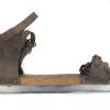 Houten schaats merkteken CH in een soort horloge onbekende schaatsenmaker (Duitsland)