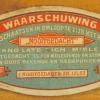 Etiket ca.1910 voor schaatsen Nooitgedagt IJlst met waarschuwing