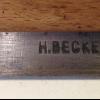 Merkteken Friese laagspringer schaatsenmaker H. Becker, Groningen